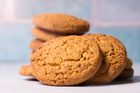 Oatmeal cookies on a light background. Close-up, selective focus.
