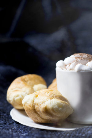 A cup of coffee and delicious growing, breakfast