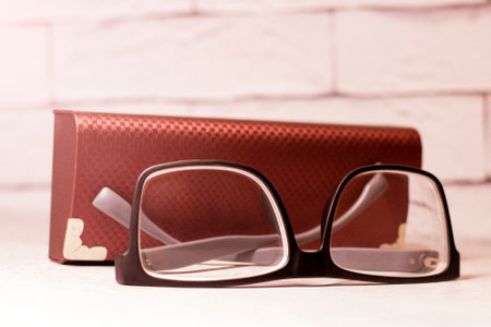 Black-rimmed eyeglasses and caseの写真素材