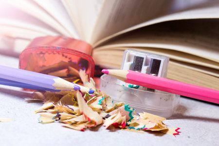 Pencil sharpener and colored shavingsの写真素材