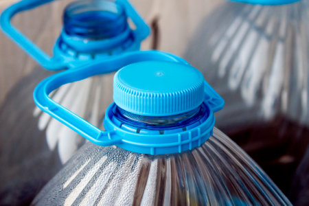 Plastic bottles with blue stoppersの写真素材