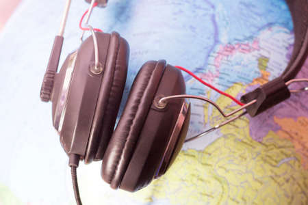 Big black headphones and a globe, world musicの写真素材