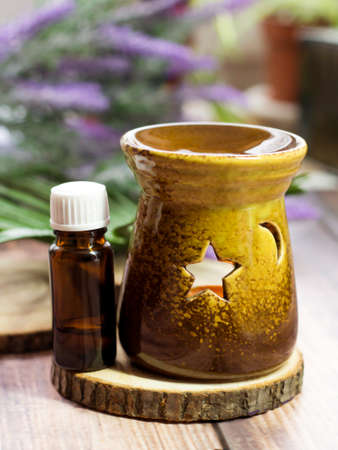 Aromatherapy essential oil in a glass bottleの写真素材