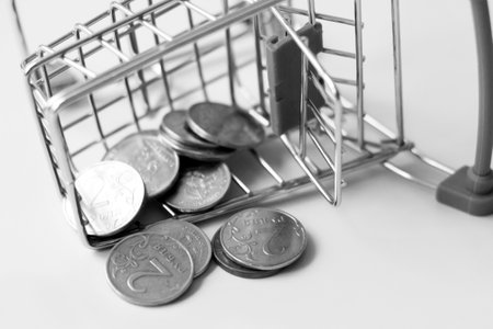 Russian coins poured out of the shopping basket, rubles.の写真素材