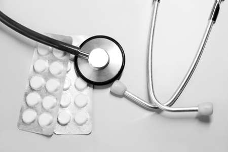 Stethoscope and pills, health and medicine conceptの写真素材