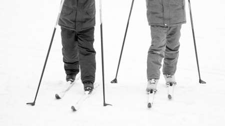 Little boys skiing with sticks, children's sportsの写真素材
