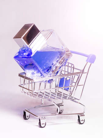 Men's perfume on a supermarket cart, buying fragrancesの写真素材