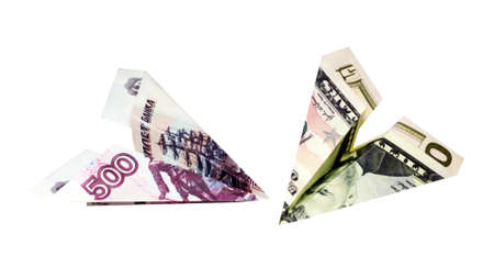 Two planes made of dollar and ruble notes, currency competitionの写真素材