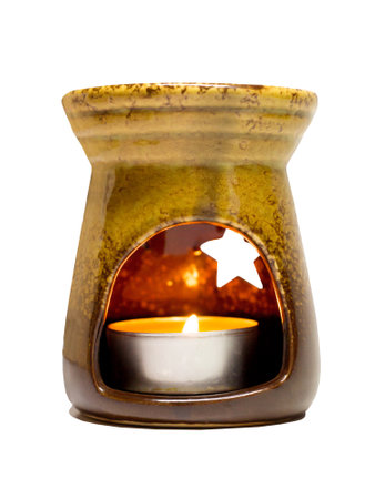 Brown ceramic aroma lamp isolated on a white backgroundの写真素材