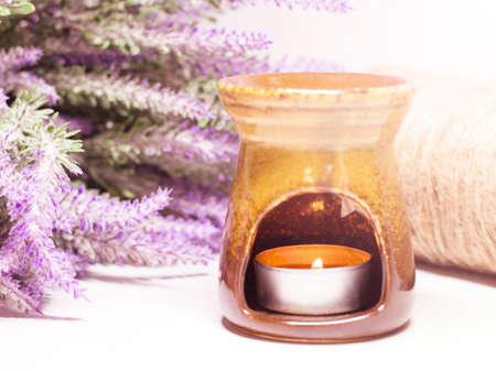 Aroma lamp, orange candle and lavender, self-care, aromatherapyの写真素材