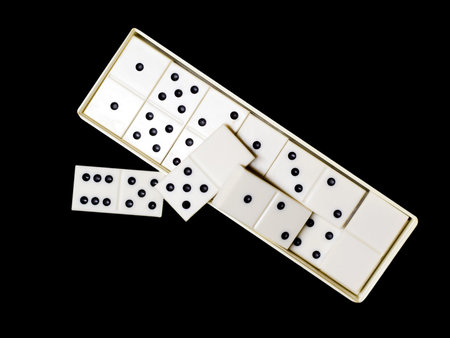 Domino, an intelligent board game. Isolated on a black background.