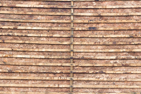 Wooden wall with wooden planks as background, closeup view