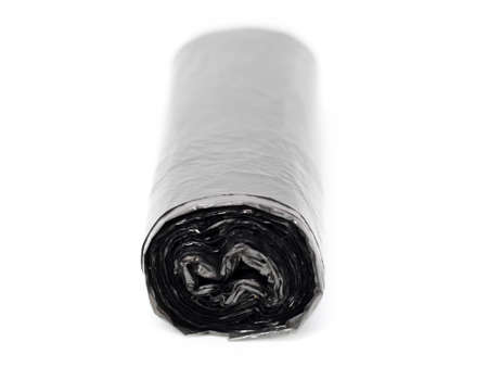 A roll of a garbage bag in black on a white backgroundの写真素材