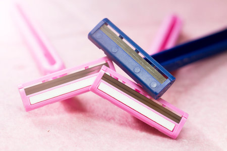 Men's blue and women's pink razors