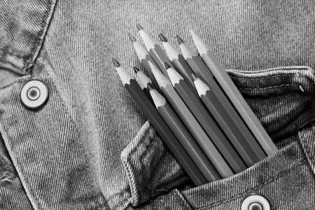 Pencils in the pocket of jeans. Black and white.の写真素材