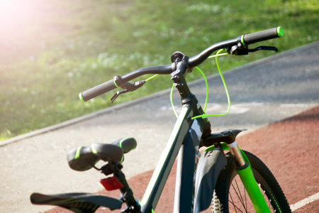 Close-up of a bicycle on the road in the park.の写真素材