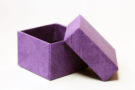 Purple gift box isolated on white background. Clipping path included.の写真素材