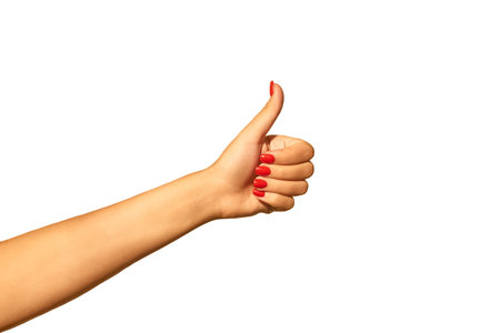 Girls hand with thumb raised up isolated on white background