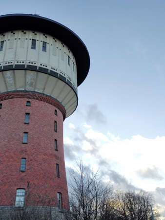 22.11.20. Riga, Latvia. Agenskalns Water Tower. Industrial architecture of Latvia. Water storage tank.のeditorial素材