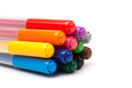 Colorful marker pens isolated on white background. Kids vivid painting tools, various color palette. Office highlighters design elementsの写真素材