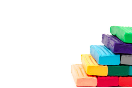 Children bright colorful plasticine isolated on white background