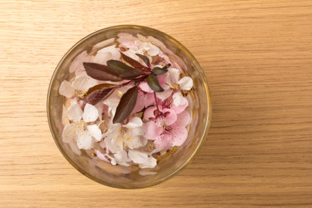 Beautiful Pink Cherry or Cherry Blossom isolated on wooden background