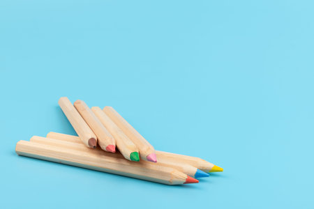 Color pencils on blue background. Back to school. Education concept