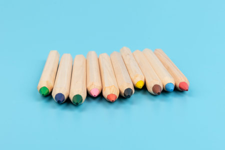 Color pencils on blue background. Back to school. Education concept