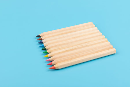 Color pencils on blue background. Back to school. Education concept