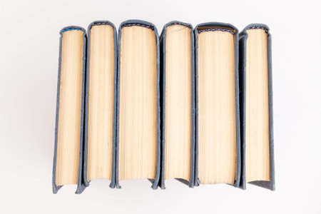 a stack of books on white. background from books. Books close up
