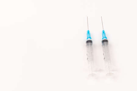 Medical plastic disposable syringe with needle. Applicable for vaccination.の写真素材