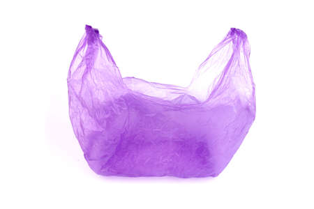 Transparent purple plastic bag with handles isolated over white backgroundの写真素材