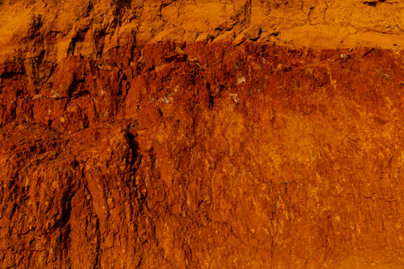 Beautiful landscape, sandy cliff over the sea. Travel concept. Beautiful nature texture