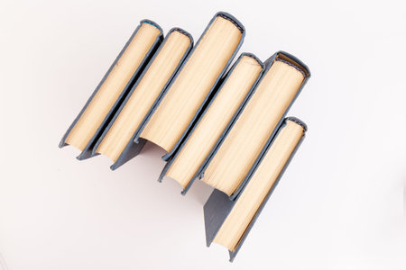 a stack of books on white. background from books. Books close up