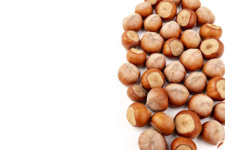 Hazelnuts on a white background. Hazelnut background, healthy foodの写真素材