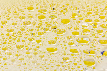 Drops of water on a color background. Selective focus.の写真素材