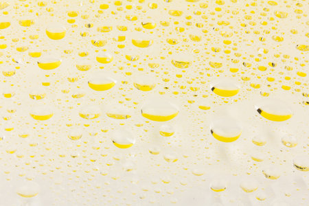 Drops of water on a color background. Selective focus.
