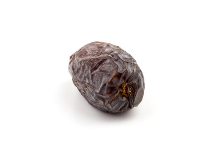 Dried date palm fruit solated on white background with clipping path. dry fruit concept.