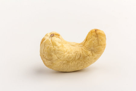 Raw cashew nuts isolated on white background. Package design element with clipping path
