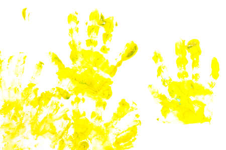 abstract background with bright multicolored paint handprints. collection of colorful child hand prints on white backgroundの写真素材