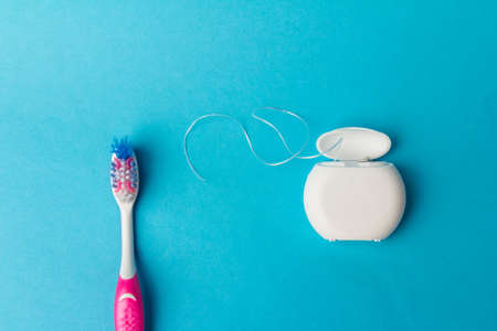 Dental floss dispenser for oral hygiene. Teeth cleaning tool background image.の写真素材