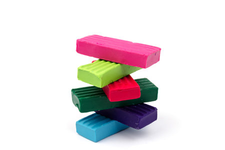 Children bright colorful plasticine isolated on white backgroundの写真素材