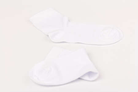 White children's cotton socks isolated on  white backgroundの写真素材