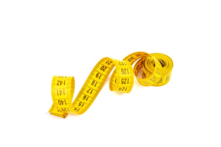 Tape measuring, isolated on white background. Centimeter. Space for text.