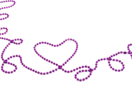 Festive background with a purple christmas beads. St. Valentine day background.の写真素材