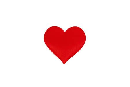 Red silk valentine heart. A symbol of love handmade. Love and togetherness concept. Design element for holiday, greeting card, postcard and banner.の写真素材