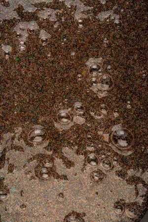Abstract textured background transparent slime with bubbles inside. Macro of kids toy slime.