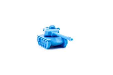 Blue Plastic Tank Toy Side View Isolated on White Background. Little plastic ABS model. blue filament. Objects printed by 3d printer Isolated on white background.の写真素材