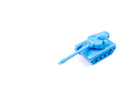 Blue Plastic Tank Toy Side View Isolated on White Background. Little plastic ABS model. blue filament. Objects printed by 3d printer Isolated on white background.の写真素材