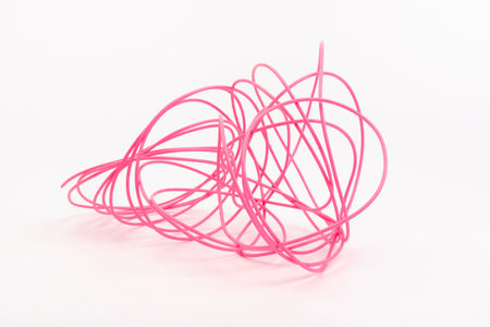 color plastic filament for printing on a 3D printer on white background
